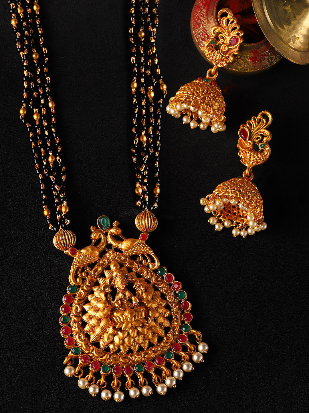 Rubans Women Gold-Plated & Black Bead Handcrafted Faux Ruby Studded Jewellery Set Price in India