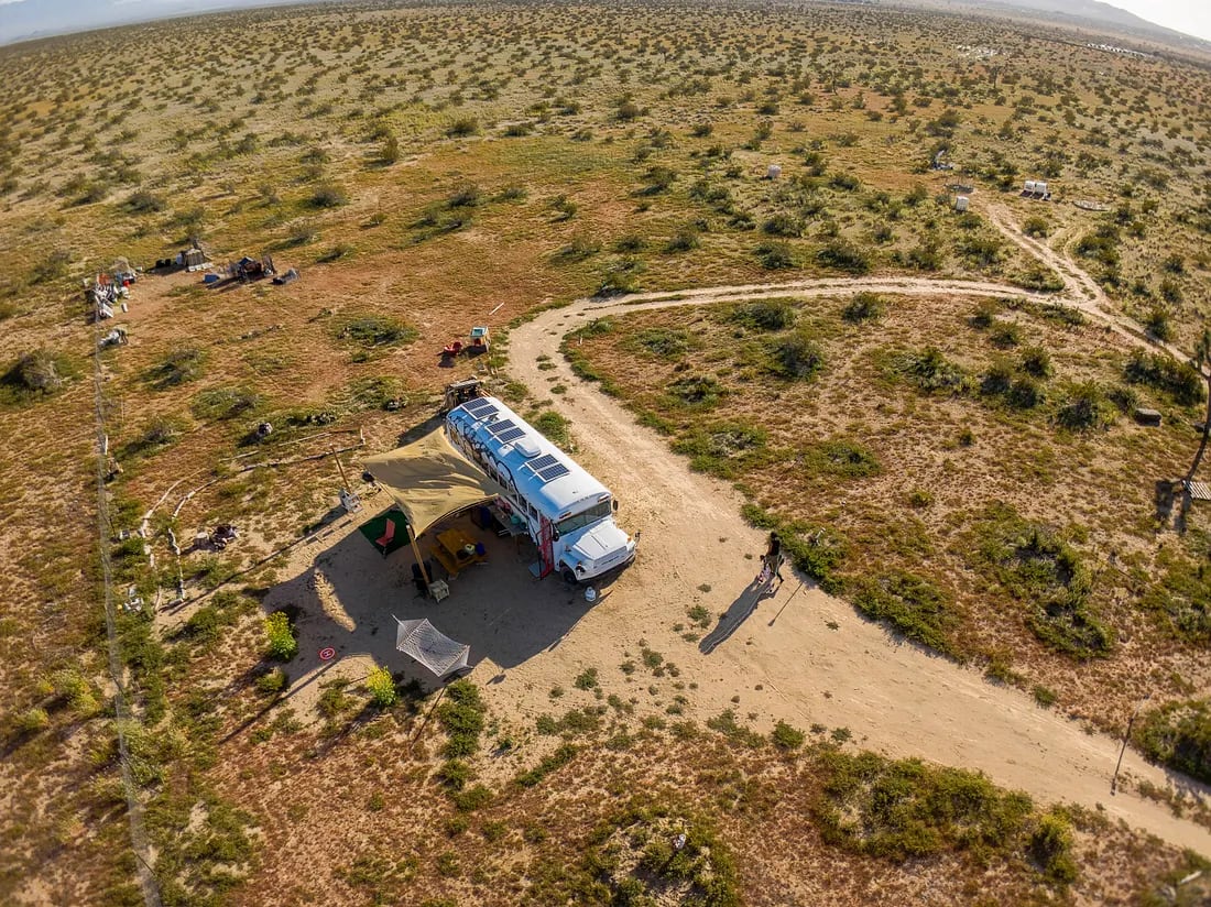 Drone shot of the Hi Vista desert landscape where For Every Star, A Tree began.