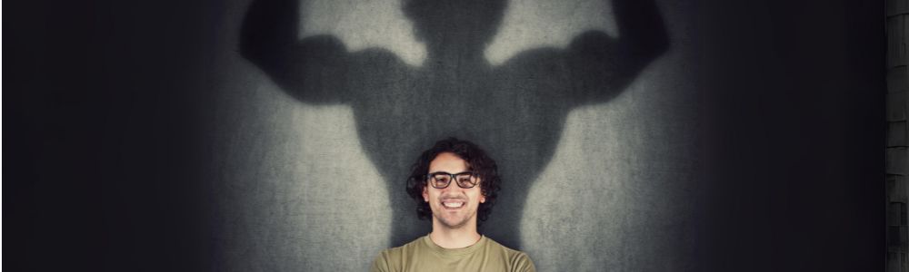 Man with shadow showing muscles