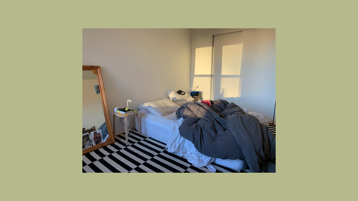 bedroom with sunlight on the closet doors