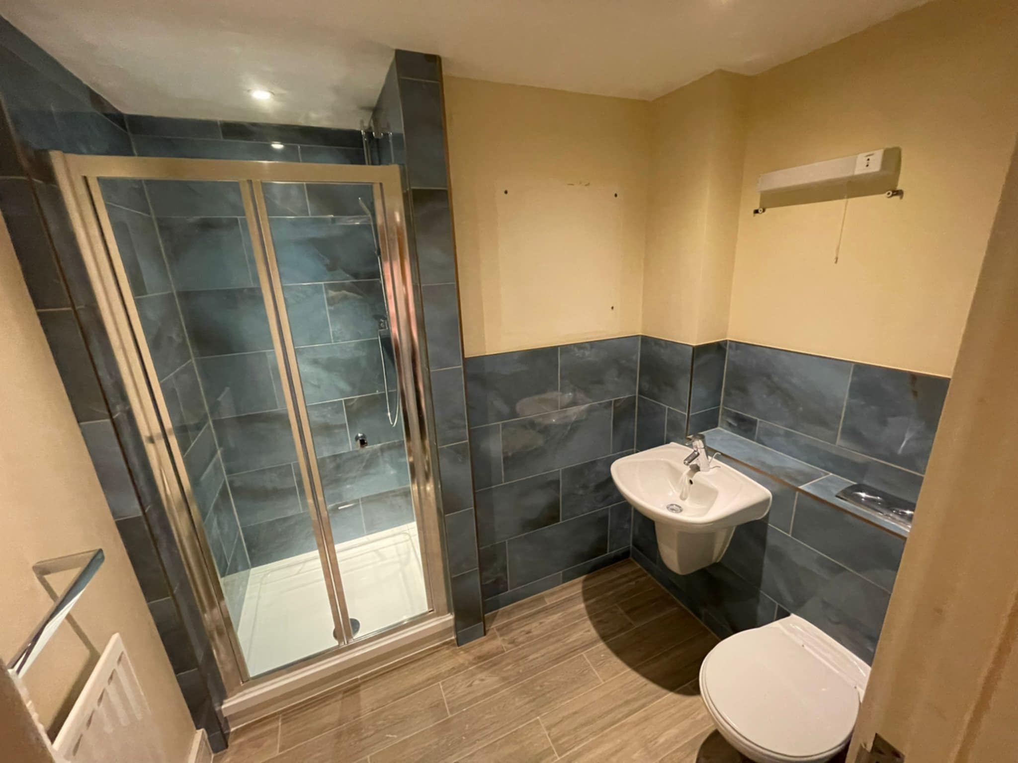 Professional bathroom tiling by Andy Bull Services in Medway