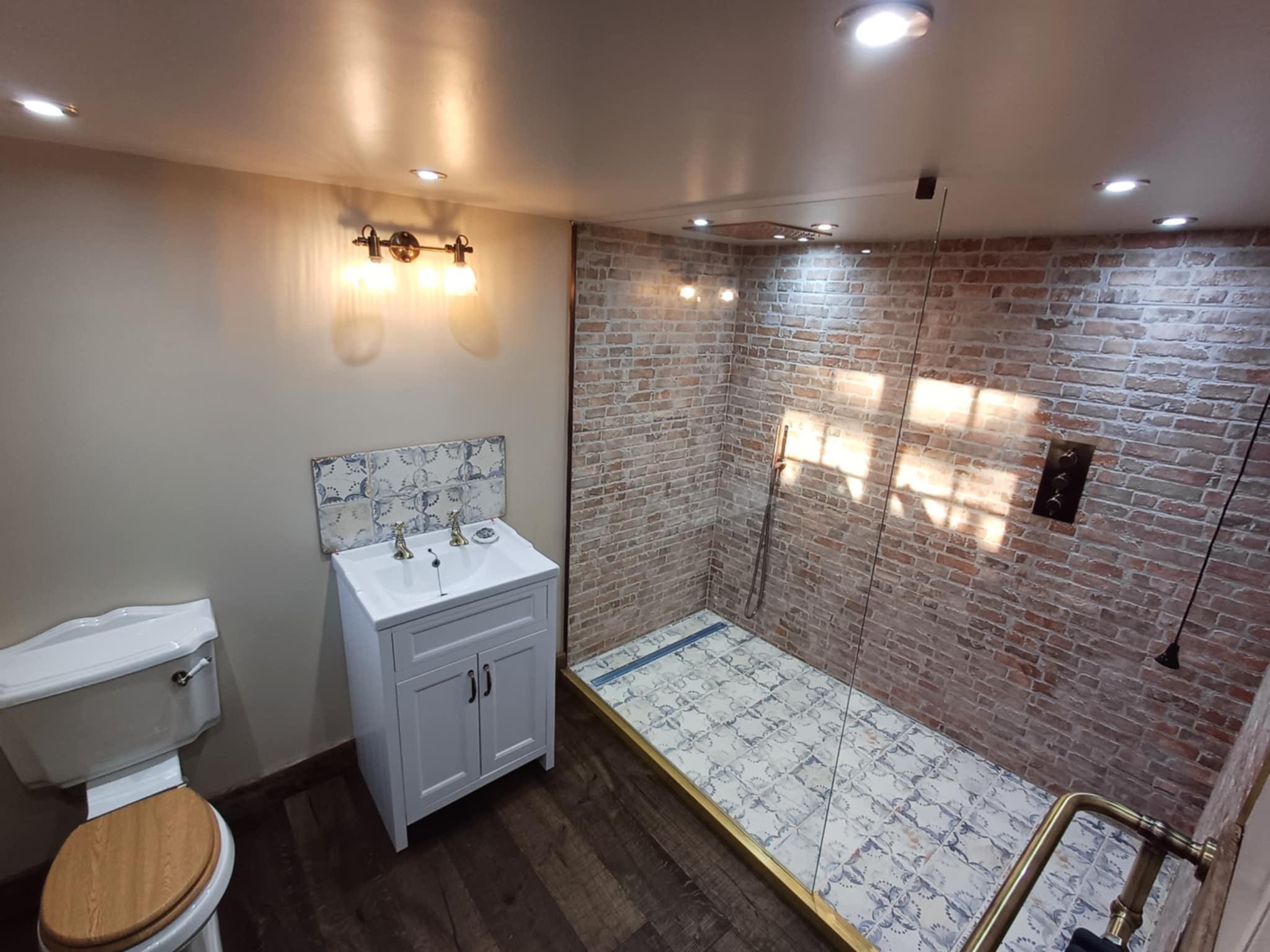 Professional shower tiling with brick pattern by Andy Bull Services