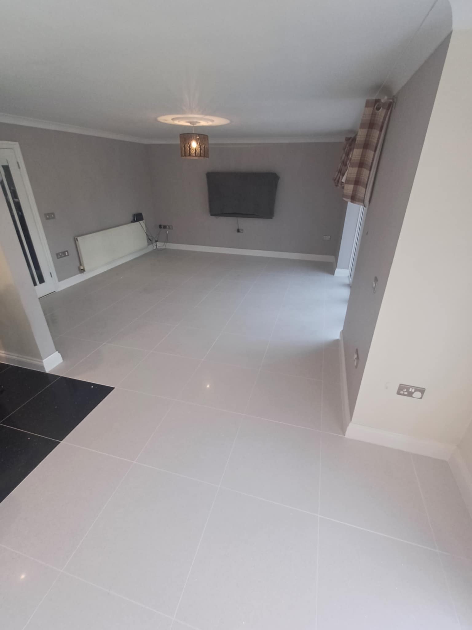 Professional interior floor tiling by Andy Bull Services