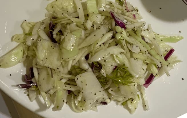 A side of green cabbage slaw.