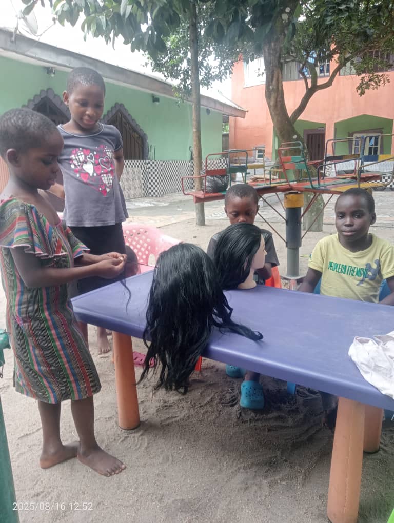 Orphanage-children-learning a skill
