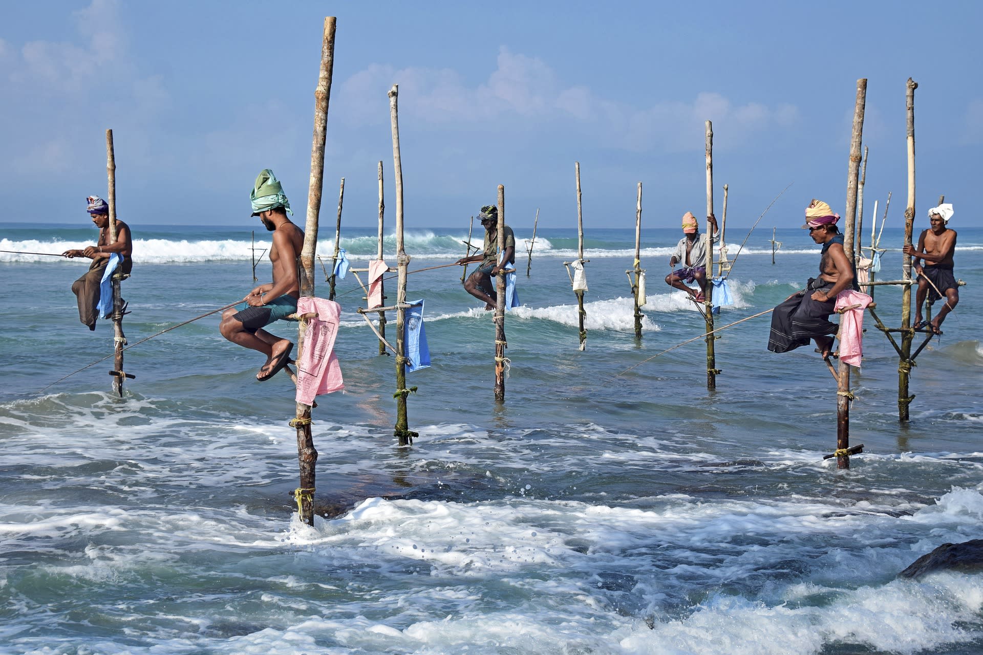 Traditional stick fishermen in Sri Lanka - cultural maritime heritage