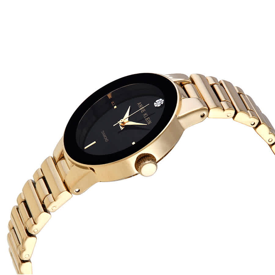 elite ladies gold tone watch