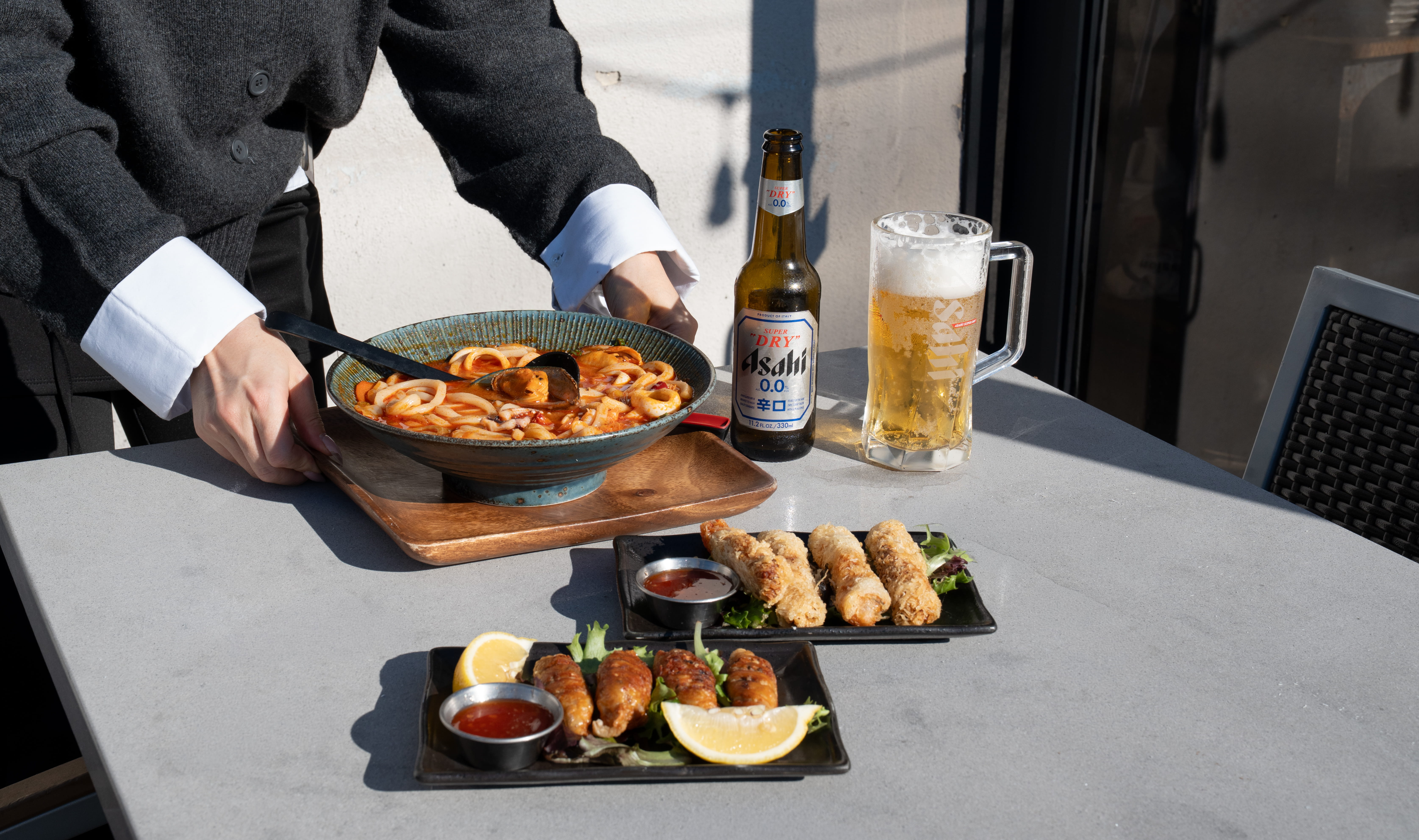 Every Bite, a Moment — decorative background image for the featured dining experience at Yume Japanese Restaurant