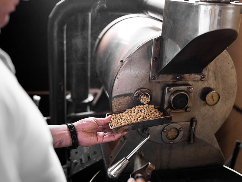 Cleaning roasters in food processing