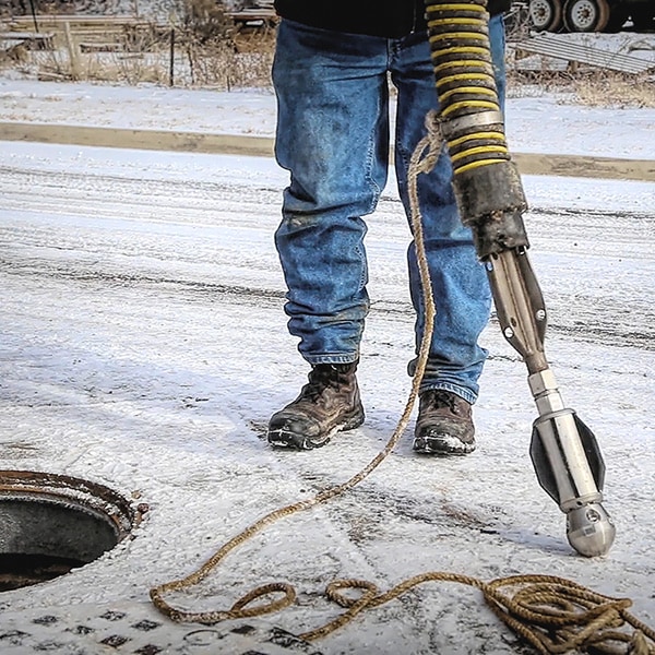 Warthog municipal manhole cleaning