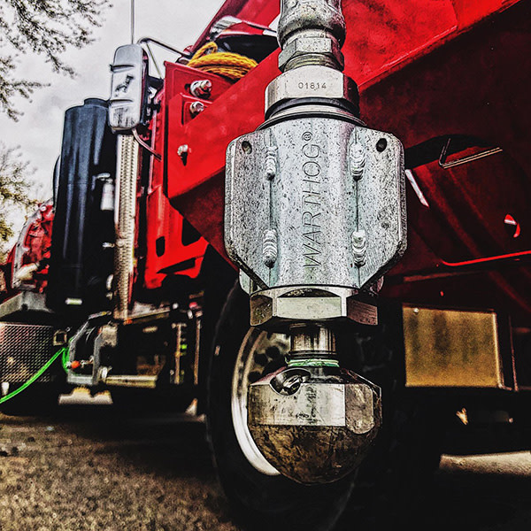 Warthog sewer nozzle on combo truck