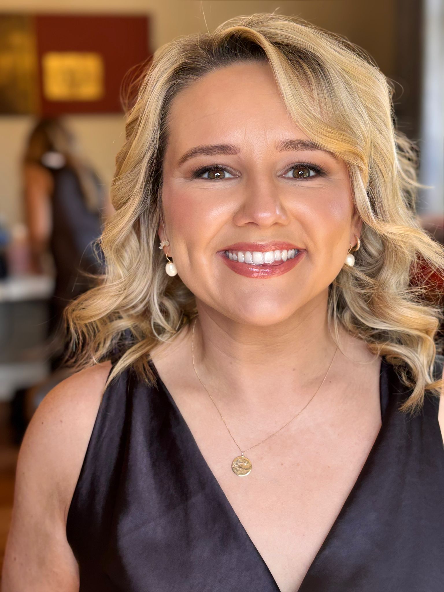 Professional bridal makeup artist working with a bride in Ireland