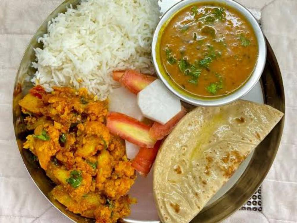 Dal Rice Sabzi Roti Salad