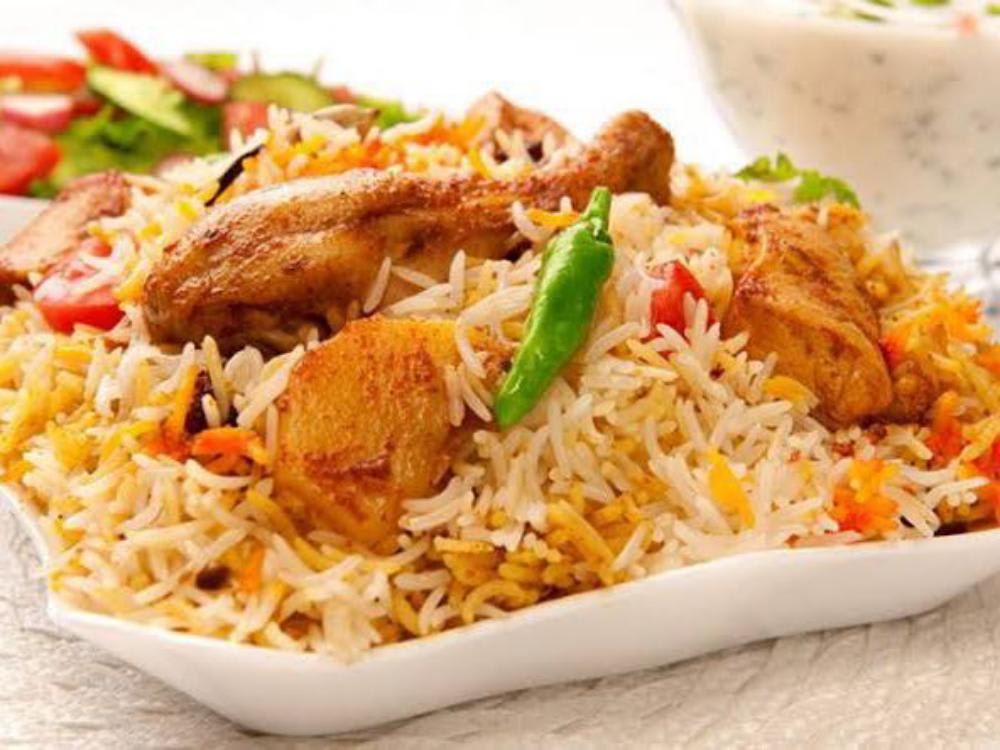 Chicken Biryani with Tamoto Chatnni (minimum 3 Pieces Of Chicken)