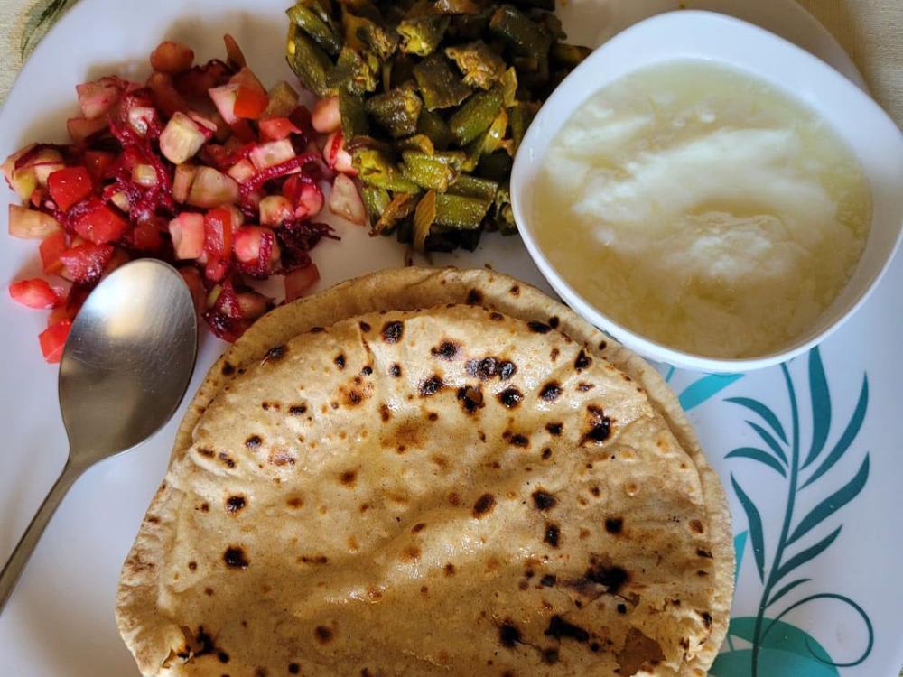 Bhindi ki Sabzi, Lauki Raita 5 Taba Roti with Salad, Achar