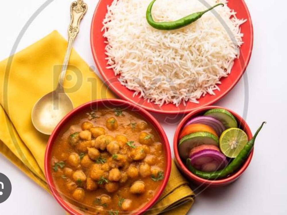 Chhole Rice Jeera Alok 2 Paraathe Salad Achar