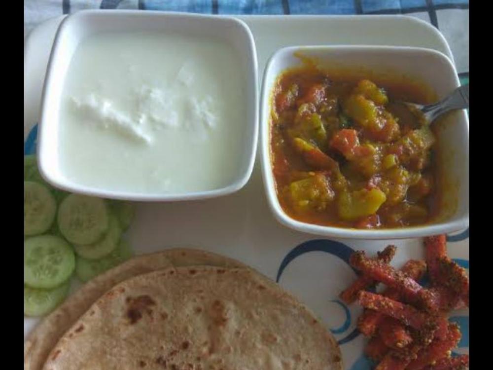 Ghiye ki Sabzi Roti Salad and Dhai