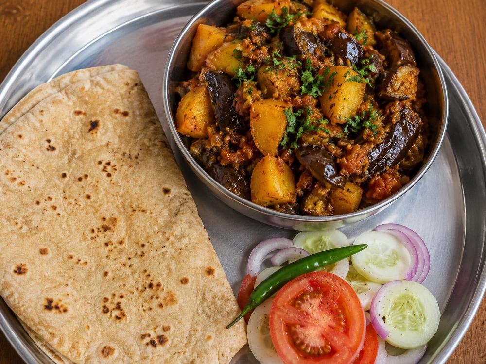 Aalu Baingan ki Sabzi Four Roti and Salad