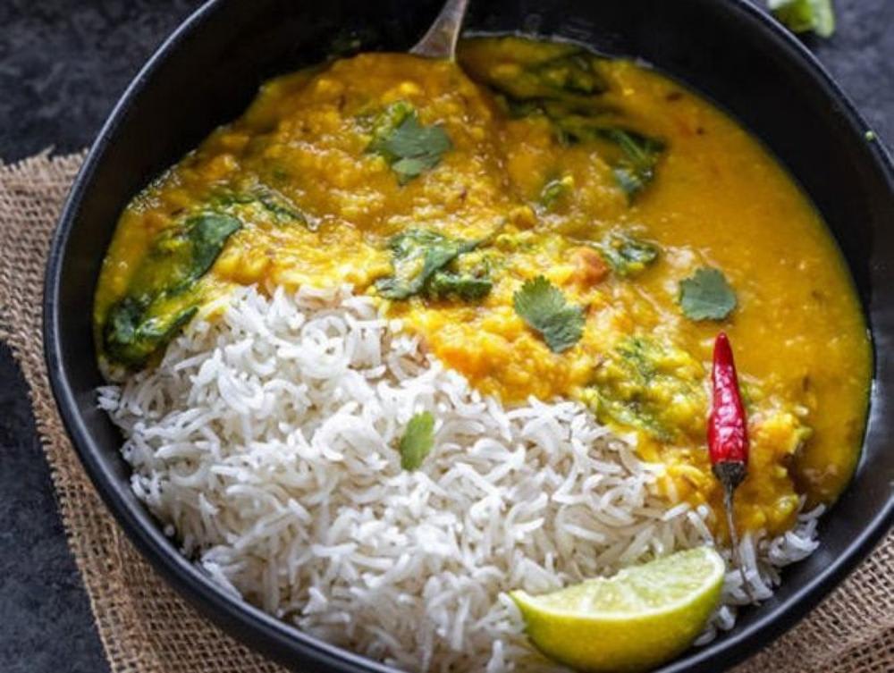 Daal mix with Rice, salad , Achar