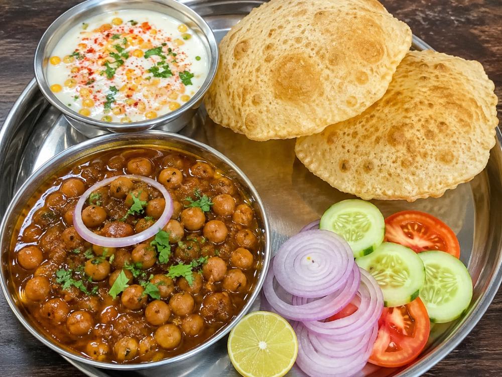 Chhole ki sabji Bundi karata 6 Puri salad