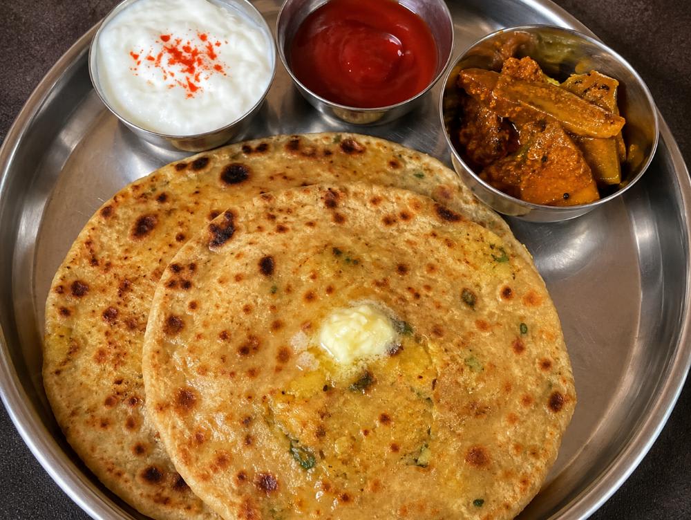 Aalu ke paraathe 4 dahi sauce aam ka Achar — home-cooked meal by Hema ki rasoi on Nomio