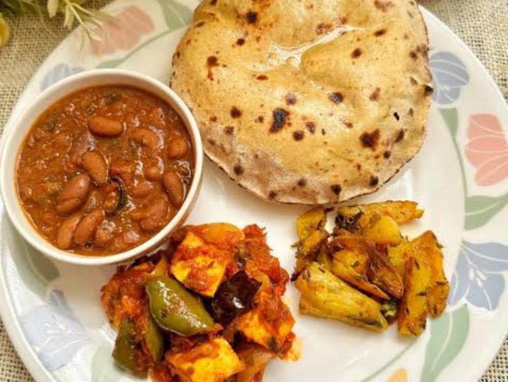 Rajma chawal or aloo simla mirch ki sabji Roti salad