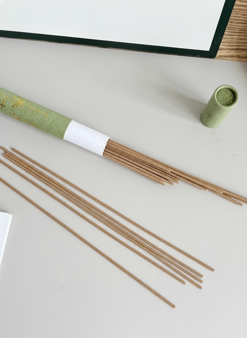 Natural incense sticks in eco-friendly green paper tube