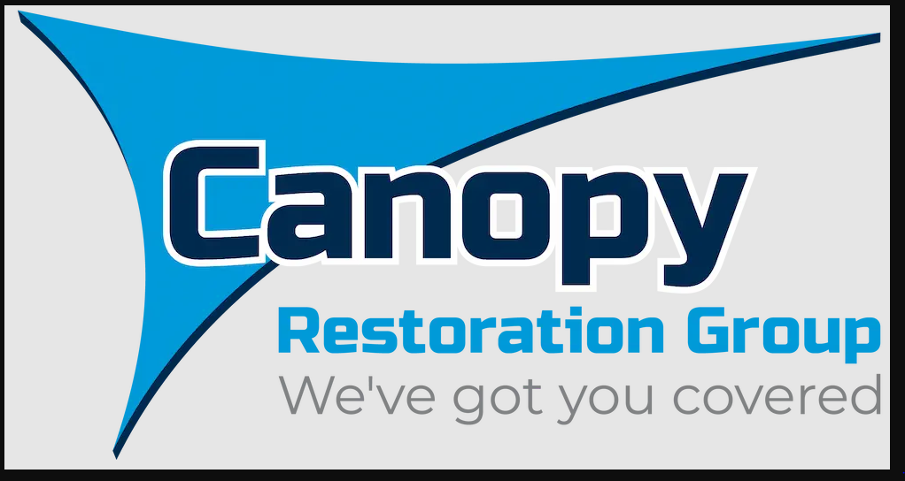 Technicians from Canopy Restoration Group of Winston-Salem performing 24/7 water and fire damage restoration work at a residential property in North Carolina following emergency structural damage.
