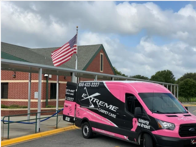 Extreme Carpet Care & Restoration technician providing professional carpet cleaning service in a residential home in Tallahassee, Florida.