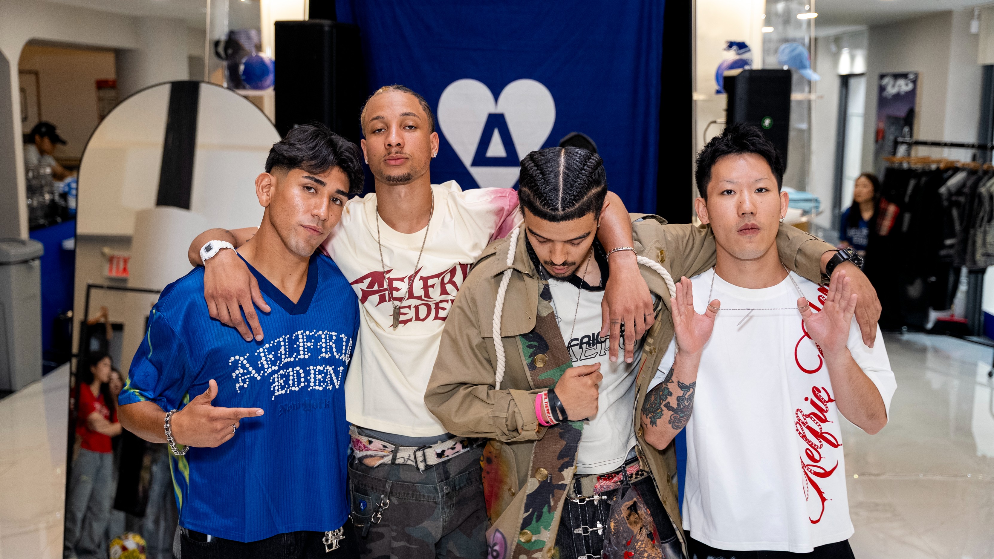 Four men posing together