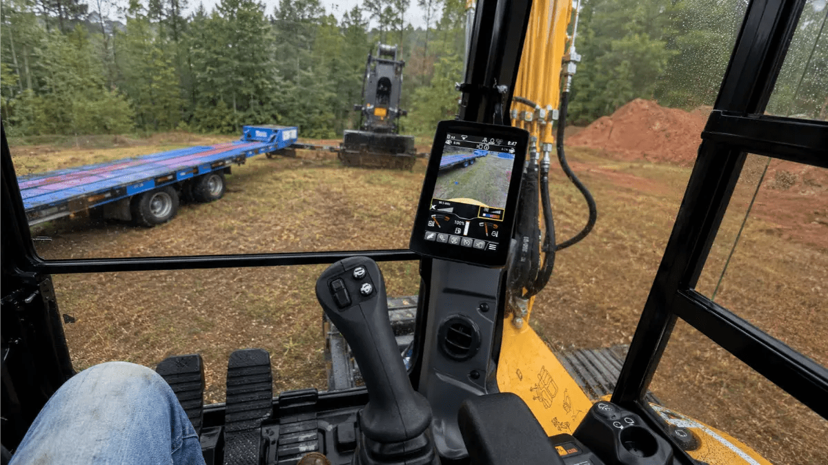In-cab LCD touchscreen inside the Cat 306 CR excavator