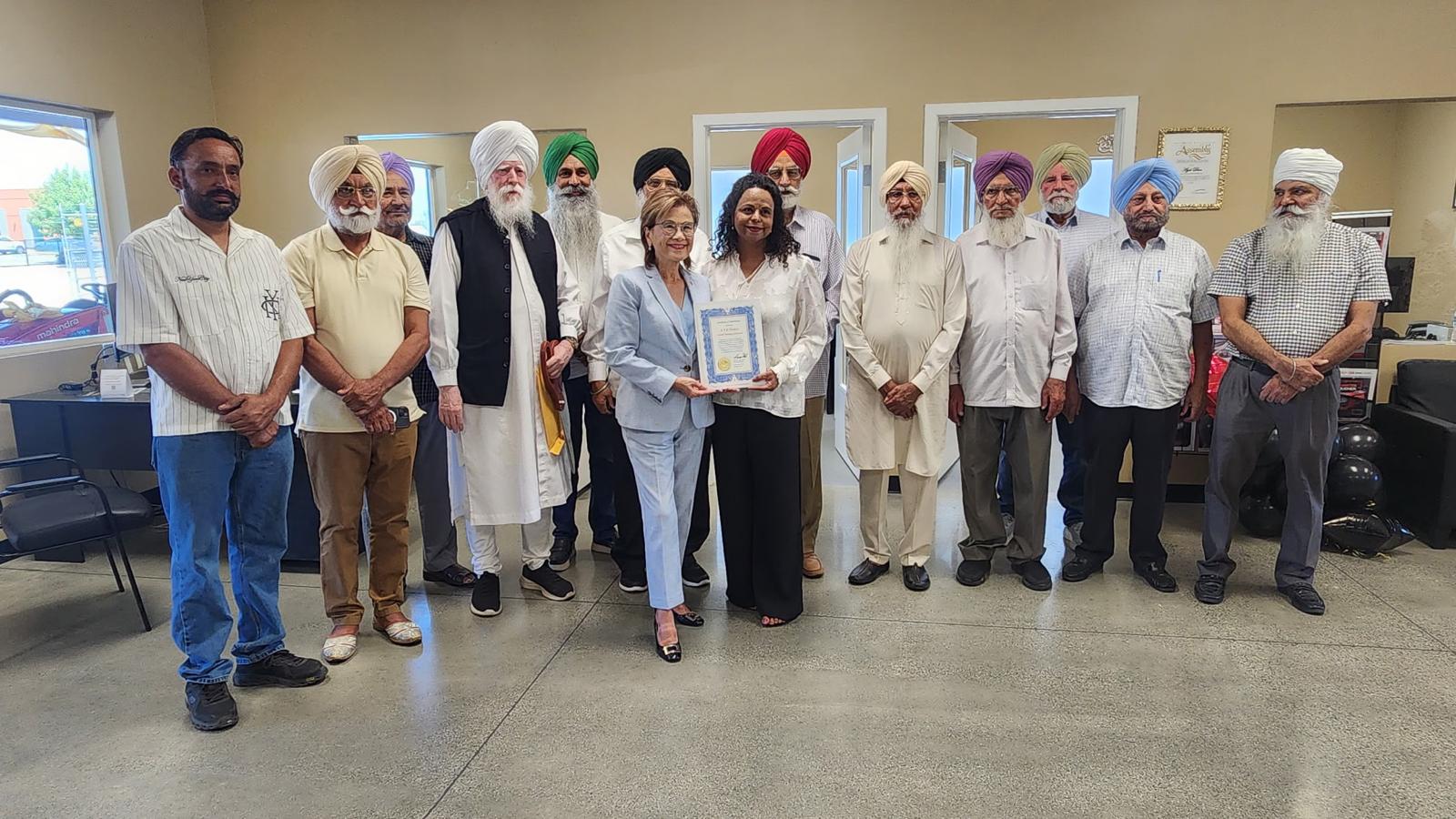 Bakersfield Mayor Karen Goh presents a Certificate of Appreciation to A.Y.D. Trailers President Nigar Sultana during the company’s Grand Opening in Bakersfield, California.