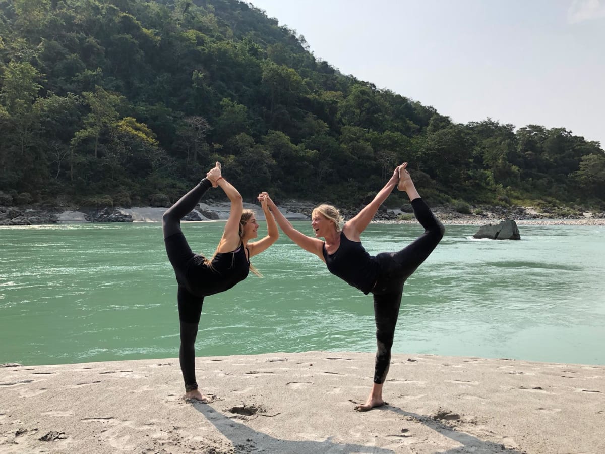 6 Tips to Practice Yoga in Your Busy Daily Schedule Yoga student doing practice at yoga beach at their 200 hour yoga teacher training in India