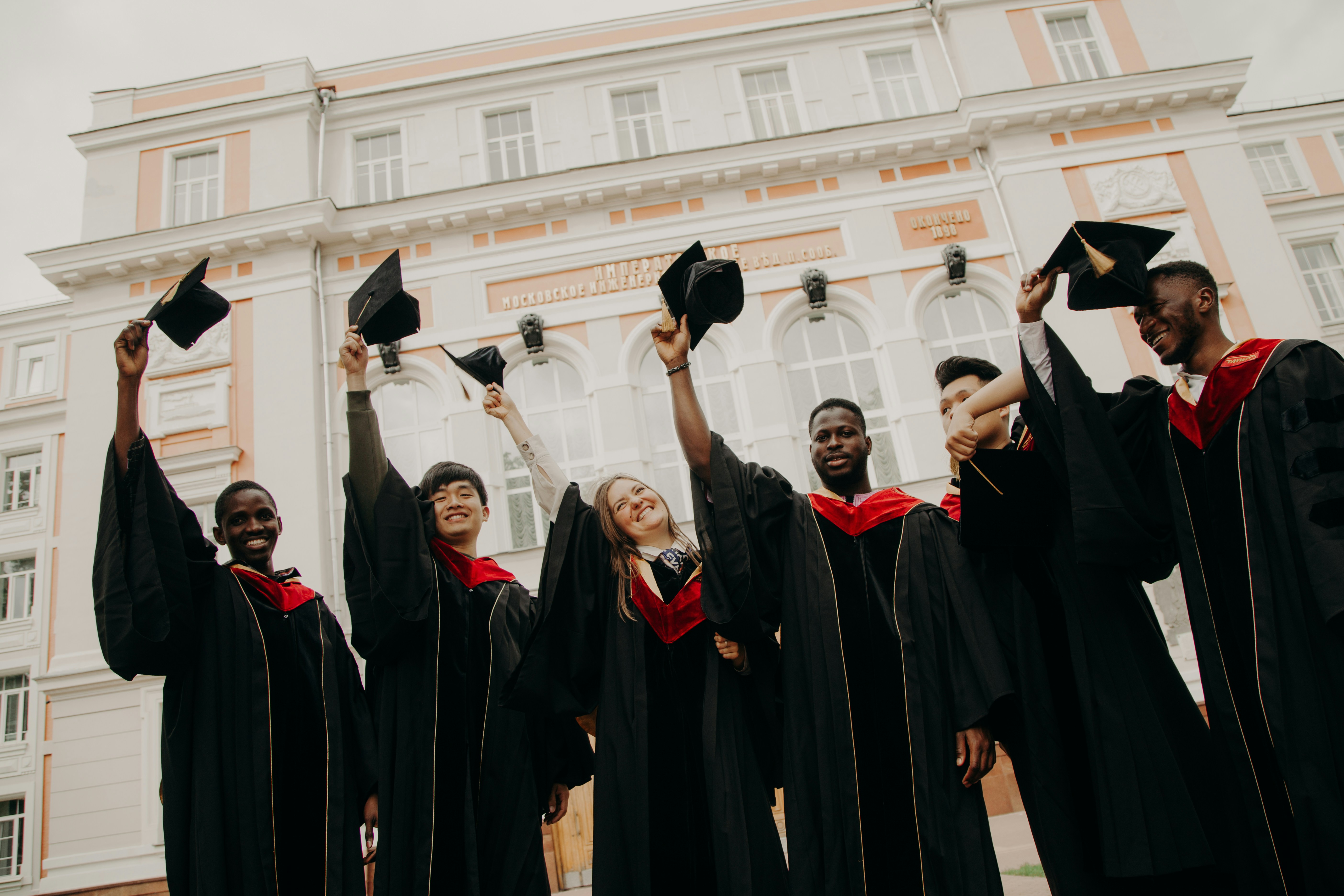Kingdom Foundation College campus ceremony with graduates and families