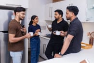 Exline Labs team sharing ideas during a coffee break