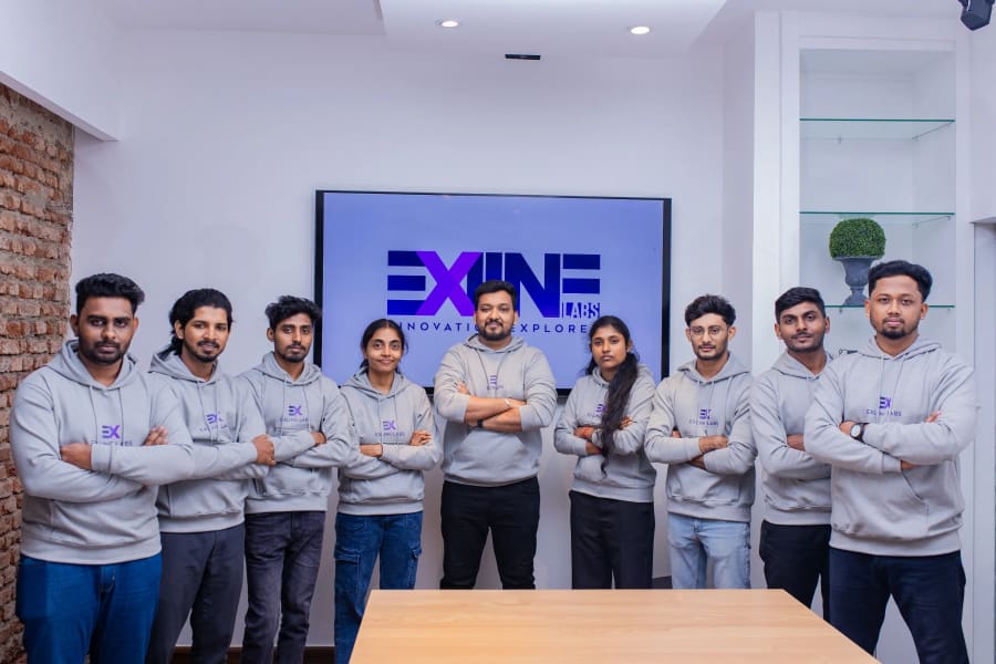 Custom software consulting company team group photo in meeting room