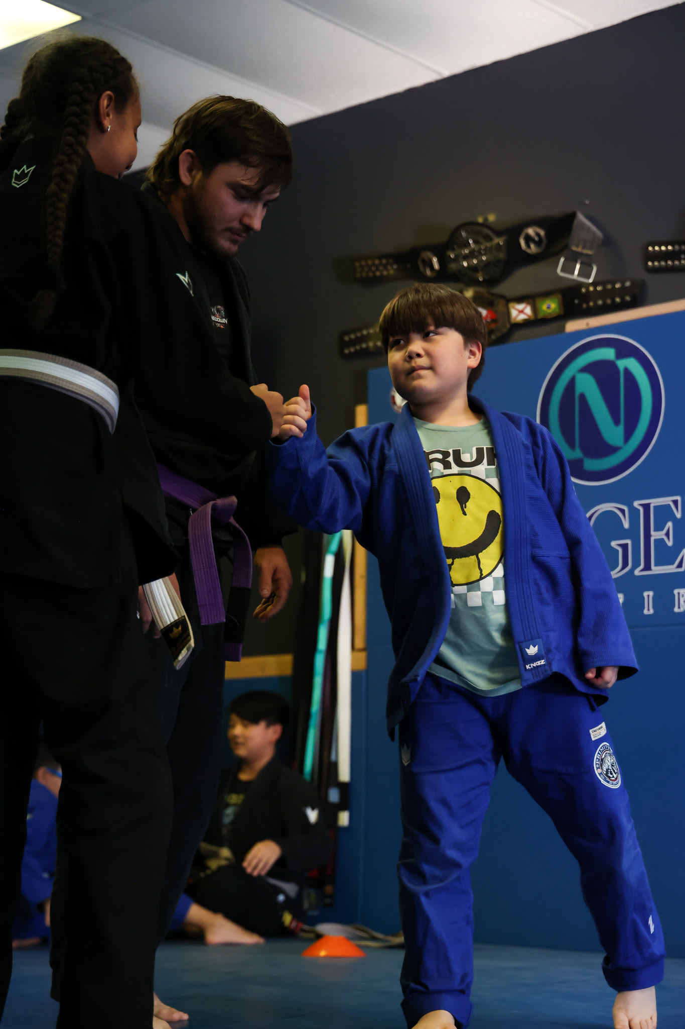 adult jiu jitsu in Lawrenceville, GA slap bump