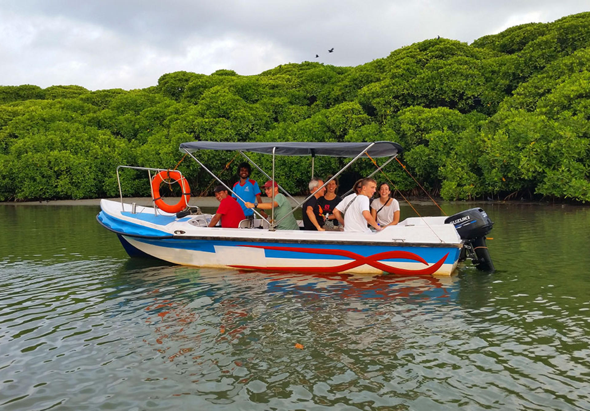 Scenic boat cruise along the historic Hamilton Canal near Chelsi Blu Hendala