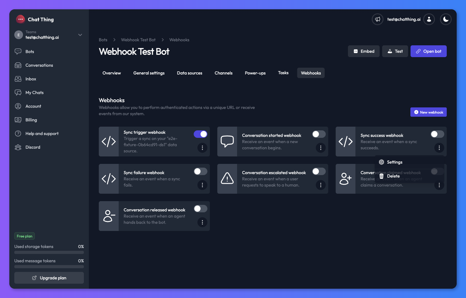 Webhooks grid with kebab menu open on a card showing Settings and Delete options