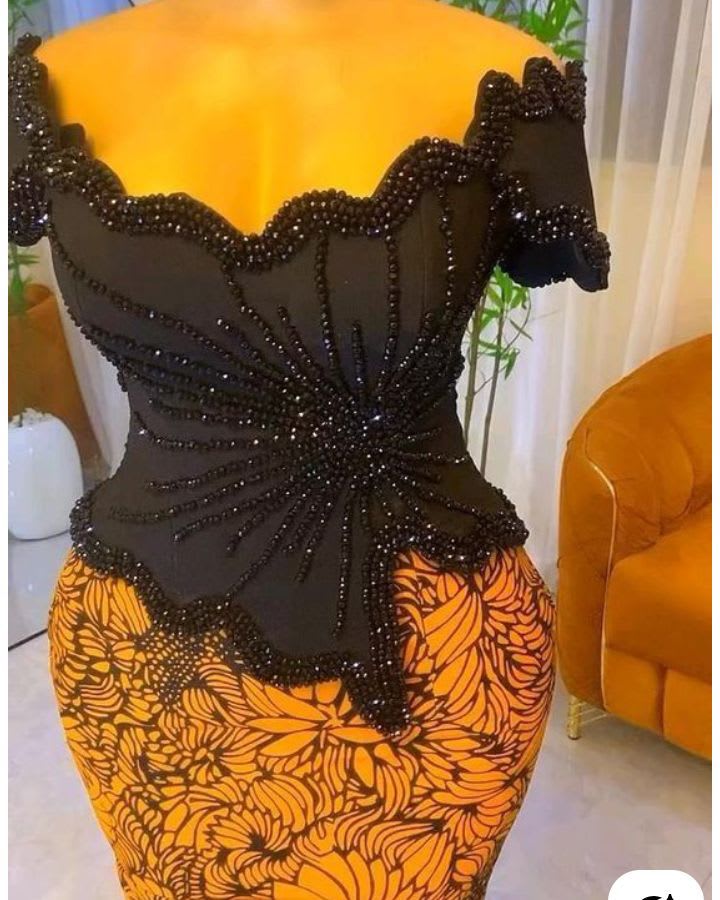 Bustier blouse with beads and straight padded skirt 