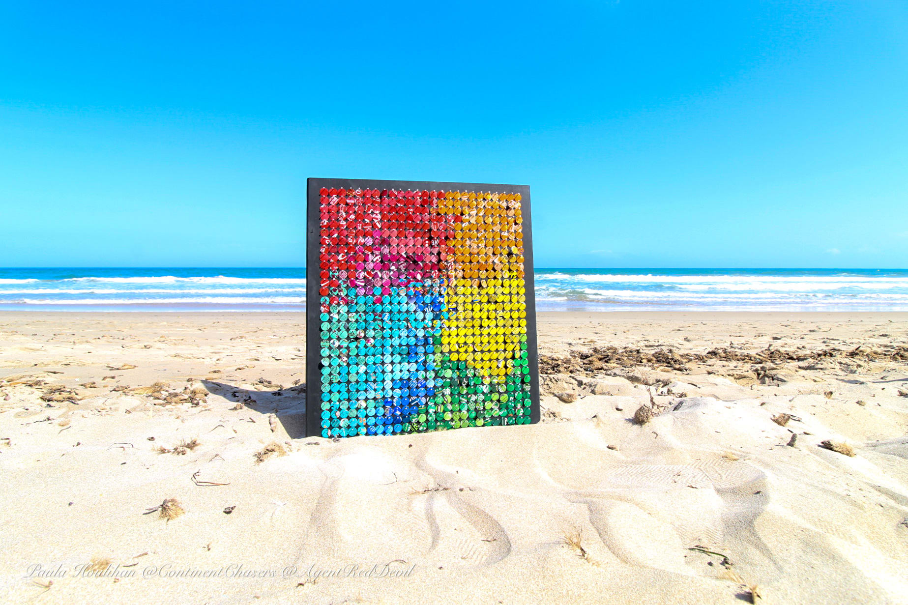 Reflective geometric artwork made from discarded aluminum cans by Stéphane Vice