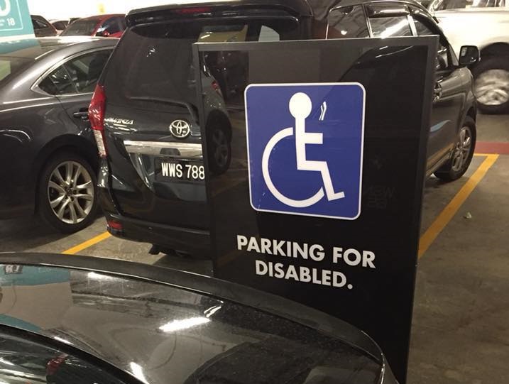 A**hole parking at reserved parking