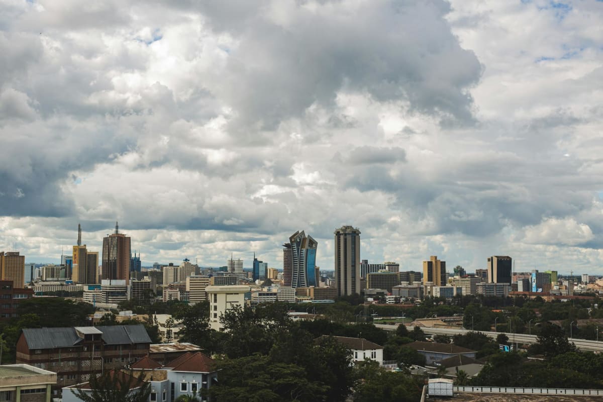 A stunning view of Nairobi's skyline under a dramatic sky.