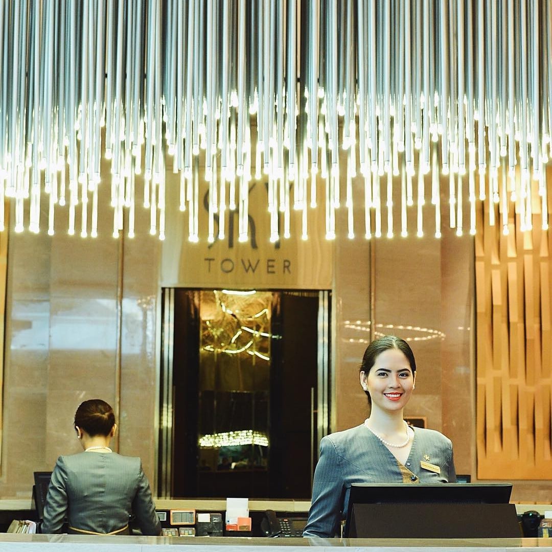 family swimming in the pool