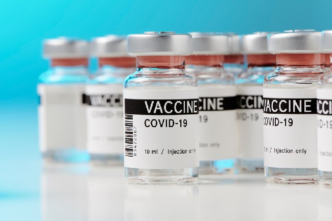 Ampoules,With,Covid-19,Vaccine,On,A,Laboratory,Bench.,To,Fight