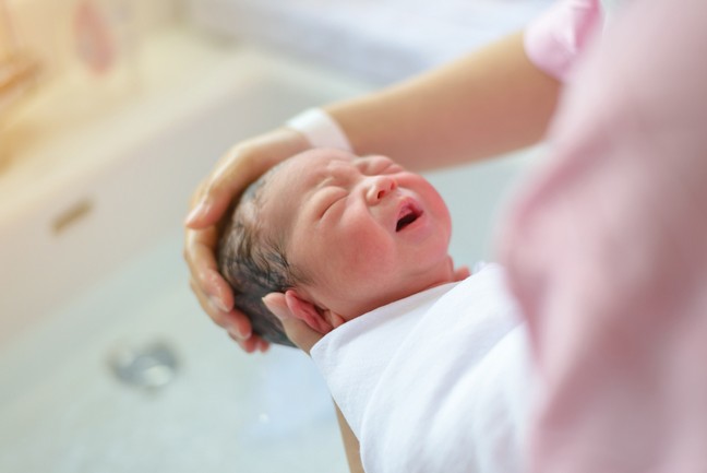 Asian,Newborn,Bathing,By,His,Mother,,Baby,Boy