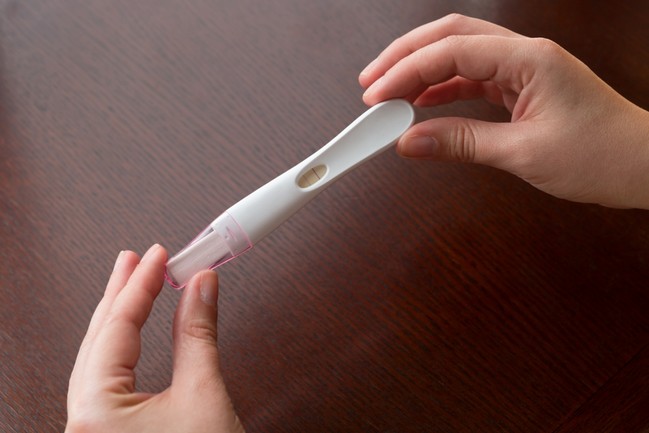 Pregnancy Test shows Two Faint Lines.