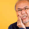 9 วิธีรักษาเหงือกอักเสบด้วยตัวเองที่เห็นผล