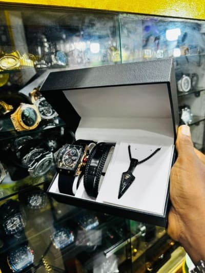 Curren, Poedegar , and Cartier watch set
