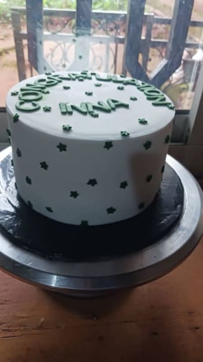 Green and White Congratulations Cake